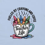 Casual Friday Tees light blue cotton t-shirt featuring a graphic of a coffee mug filled with crayons and text.